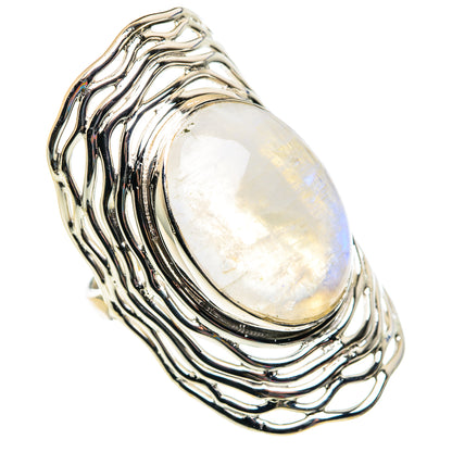 Sterling silver oval moonstone ring with wavy bezel, reflective rainbow shimmer