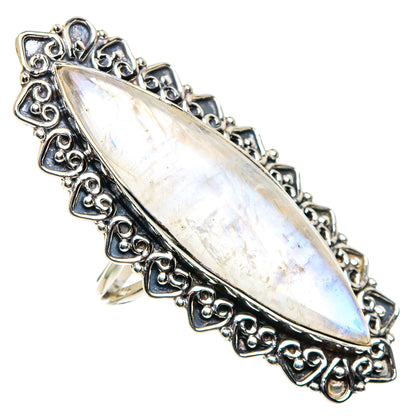Moonstone marquise sterling silver ring with ornate filigree frame, iridescent face
