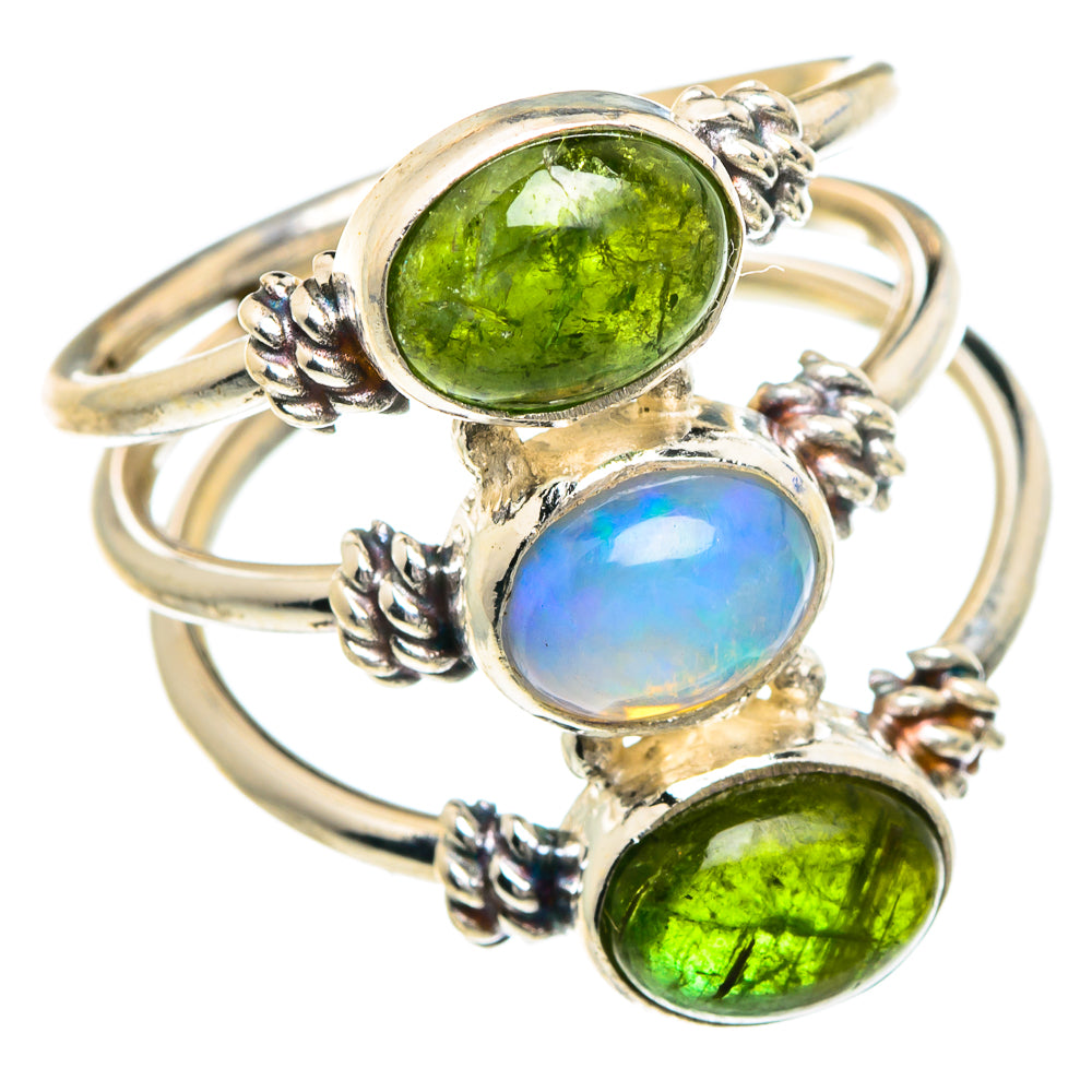 Sterling silver three-stone ring with green gemstones and blue opal, detailed prongs