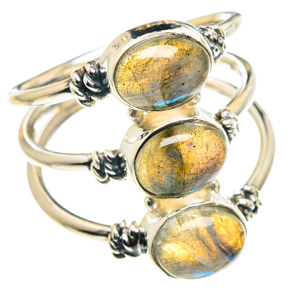 Sterling silver ring with three bezel-set oval labradorite stones with golden flashes