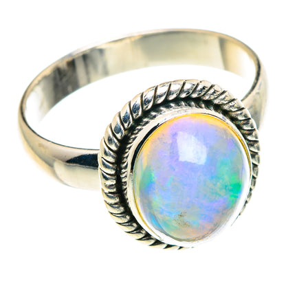 Round iridescent opal ring with braided bezel and 925 sterling silver band