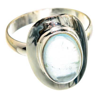 Sterling silver ring with oval light-blue stone bezel and smooth band