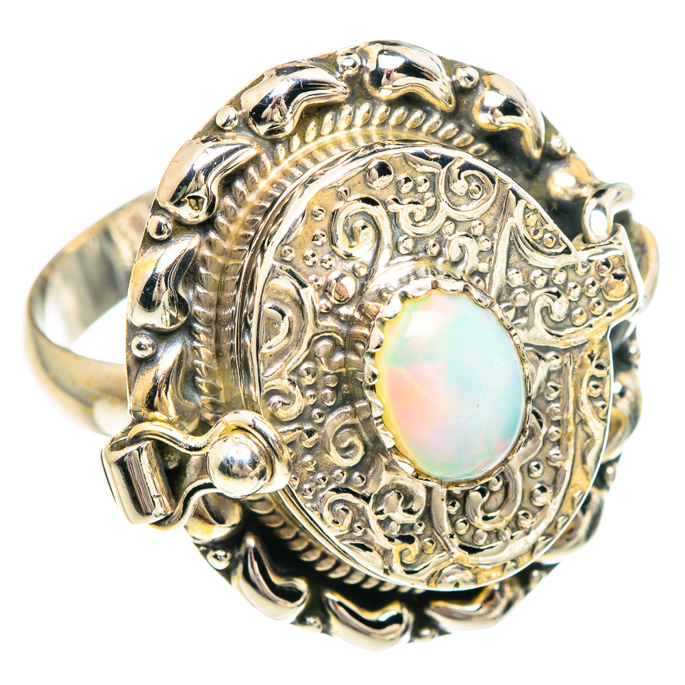 Sterling silver opal ring with ornate filigree and oval opal cabochon, size 10.75
