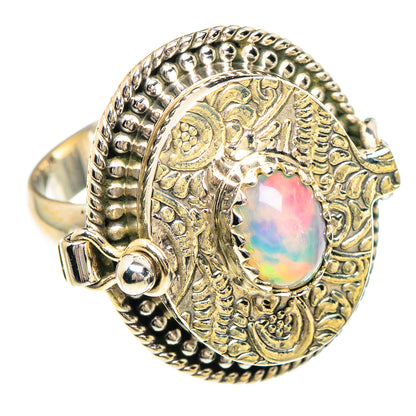 Oval opal cabochon statement ring in textured 925 sterling silver with ornate bezel