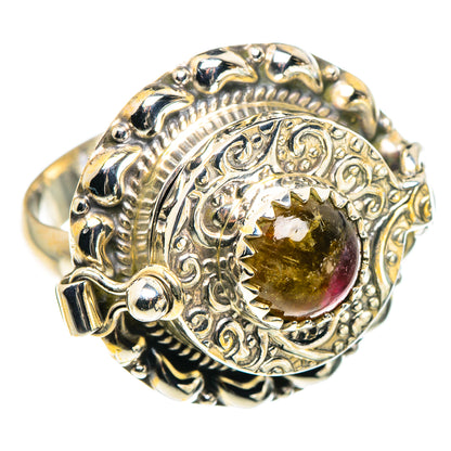 Sterling silver ornate ring with large oval yellow-brown gemstone bezel setting