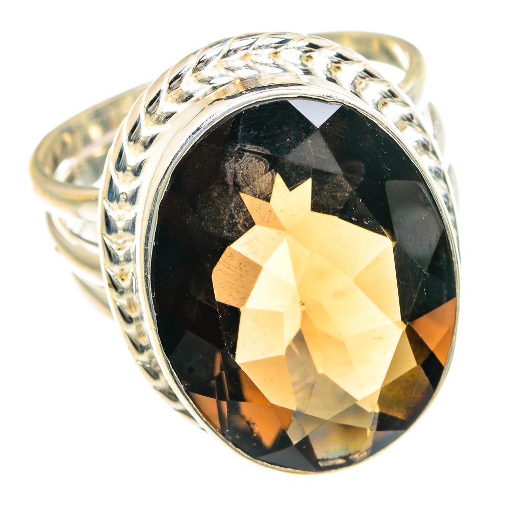 Silver ring with large faceted smoky quartz oval and textured side band setting