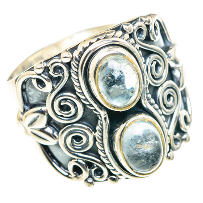 Sterling silver ring with two stacked oval light blue stones and ornate filigree