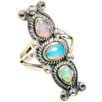 Sterling silver ring with three oval Ethiopian opal-style gemstones, ornate prong settings