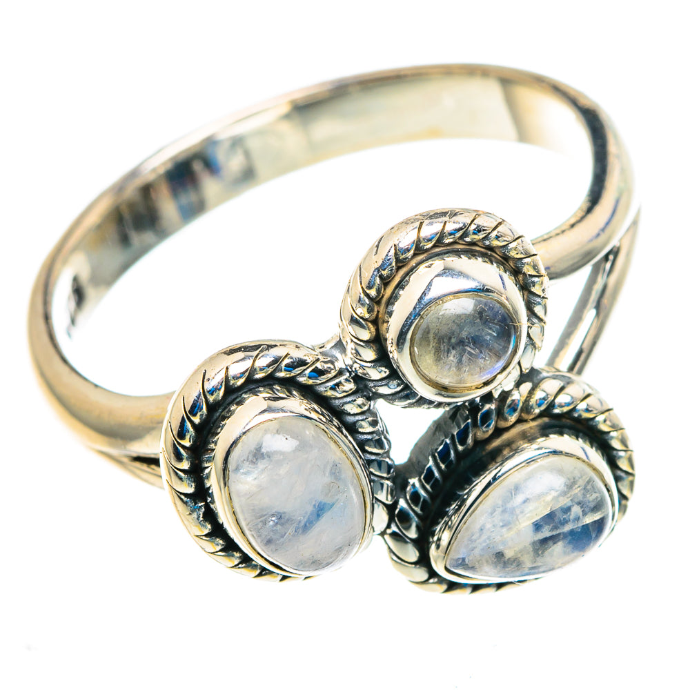 Sterling silver three-stone ring with oval blue-green cabochons, ornate bezel