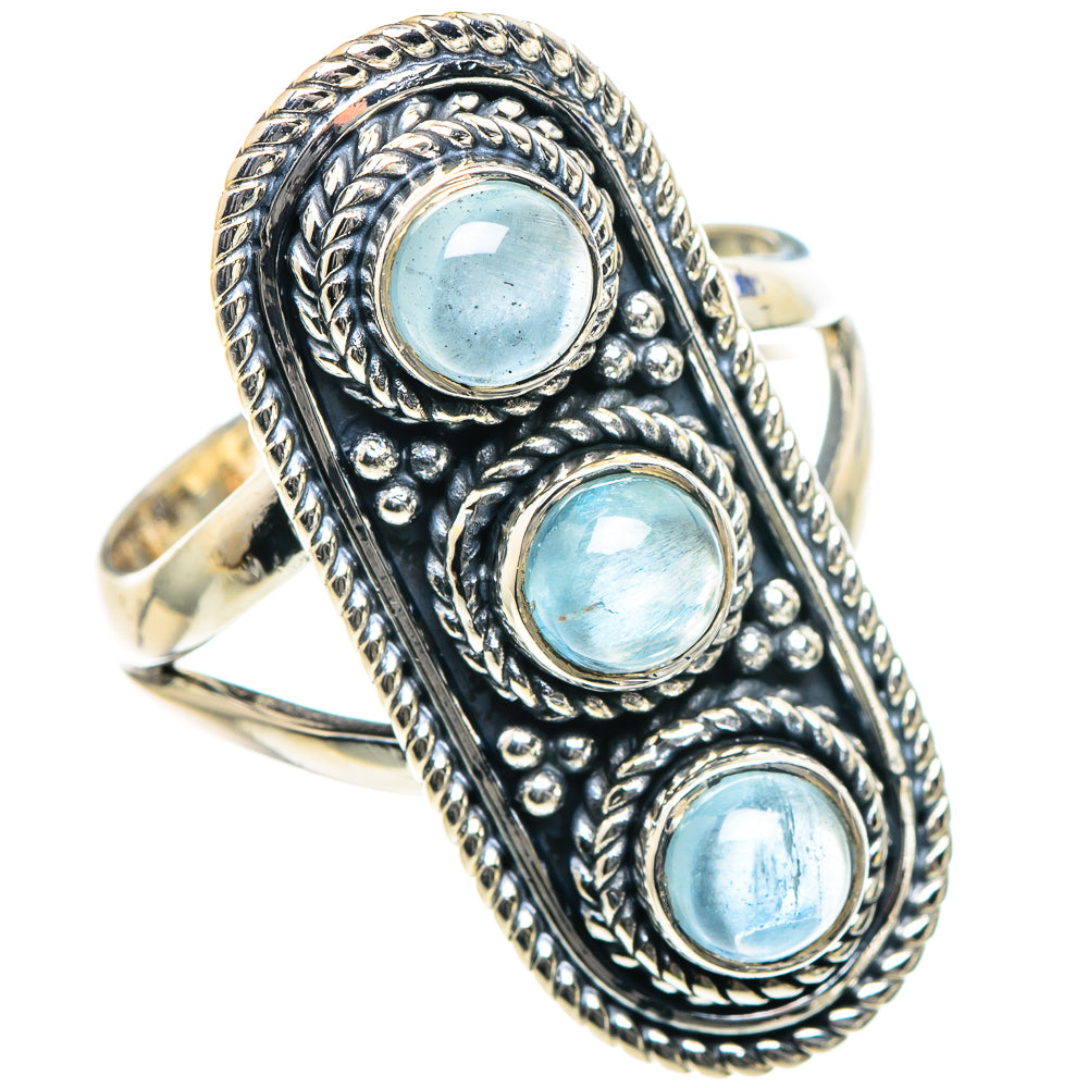 Sterling silver aquamarine ring with three oval blue stones in an engraved ropework frame
