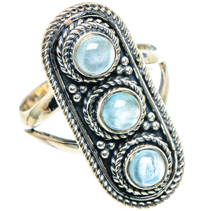 Sterling silver aquamarine ring with three oval blue stones in an engraved ropework frame