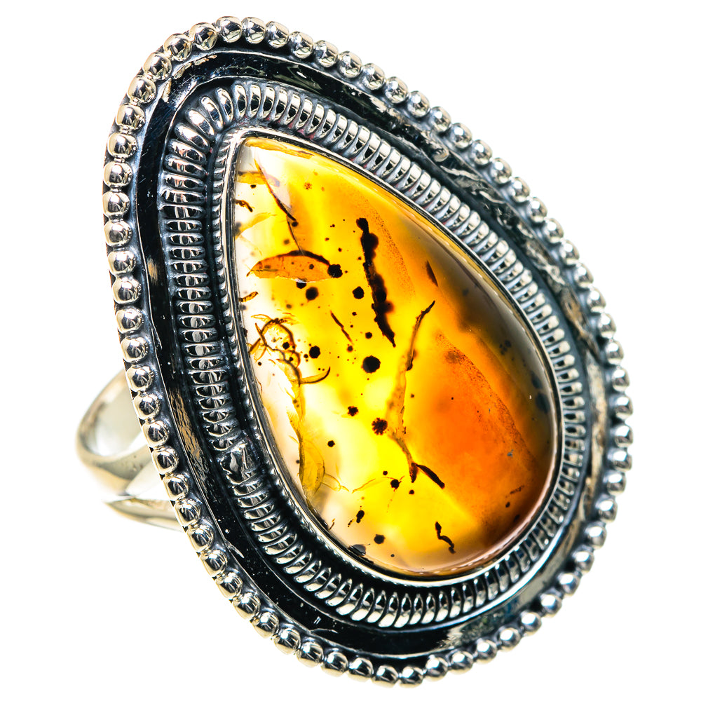 Montana agate ring, oval yellow-orange stone with black speckles, rope bead silver frame