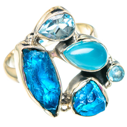 Sterling silver ring with oval aqua-blue stone and rough blue gemstone cluster