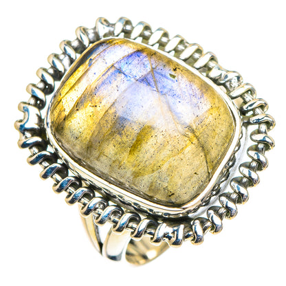 Sterling silver oval labradorite ring with yellow-blue shimmer, halo bezel setting