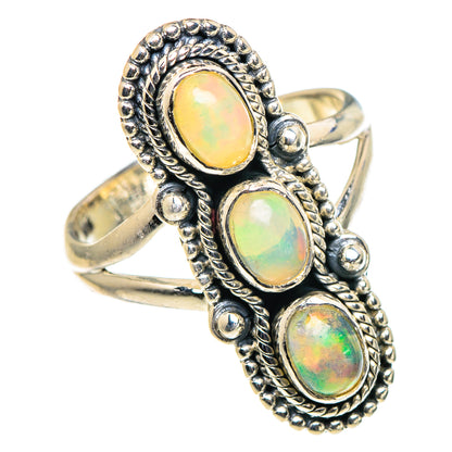925 sterling silver opal ring with three oval opal stones and small round bezel details
