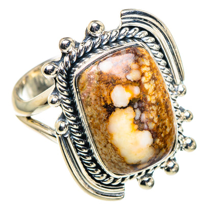 Sterling silver oval jasper ring, side view with carved frame and brown cream stone