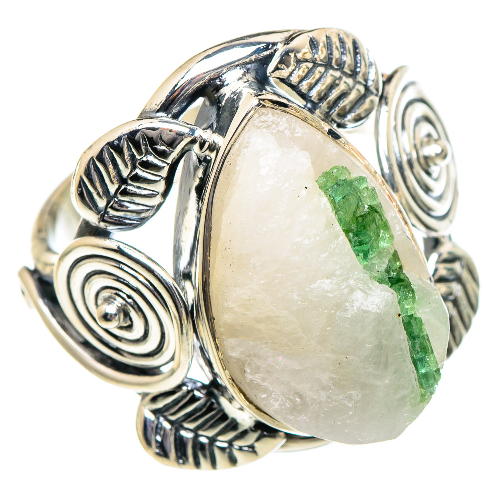 Oval quartz ring featuring green tourmaline stripe, detailed sterling silver setting