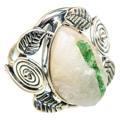 Oval quartz ring featuring green tourmaline stripe, detailed sterling silver setting