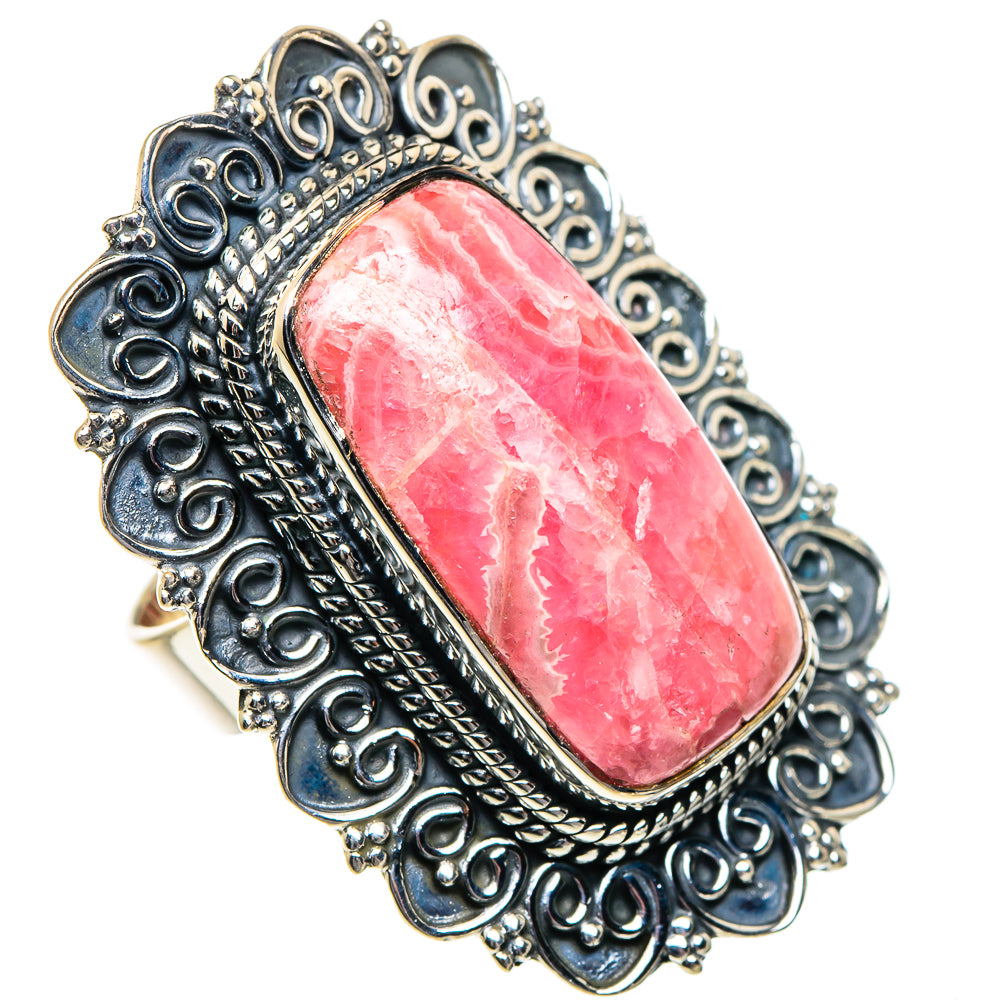 Sterling silver ring with oval pink rhodochrosite and ornate filigree setting
