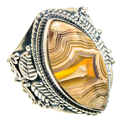 Large oval lace agate ring with silver rope bezel and ornate filigree band