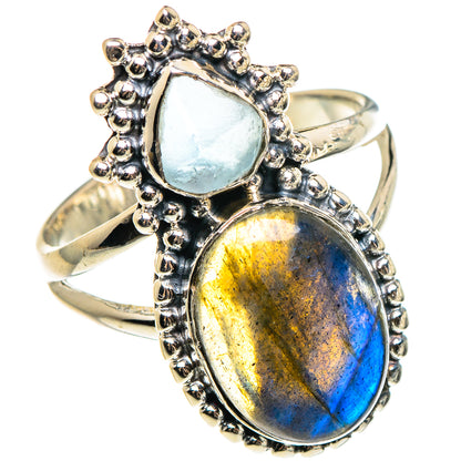 Sterling silver ring with two oval gemstone settings in iridescent blue and aqua