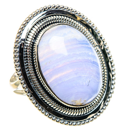 Oval blue lace agate cabochon on silver ring with ornate beaded outer border, side view