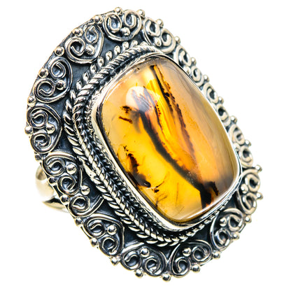 Oval Montana agate ring with 925 sterling silver filigree bezel, amber yellow cabochon.