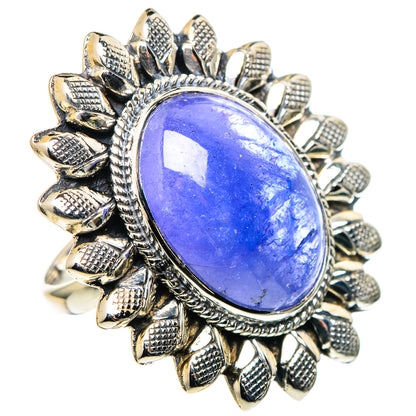 Oval blue gemstone ring with sterling-silver sunburst prong setting