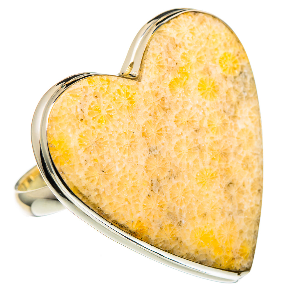Heart-shaped fossil coral ring with silver bezel and split open band