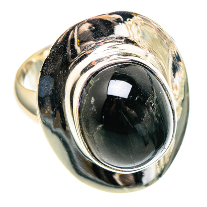 Sterling silver ring with oval black gemstone and twisted bezel detail