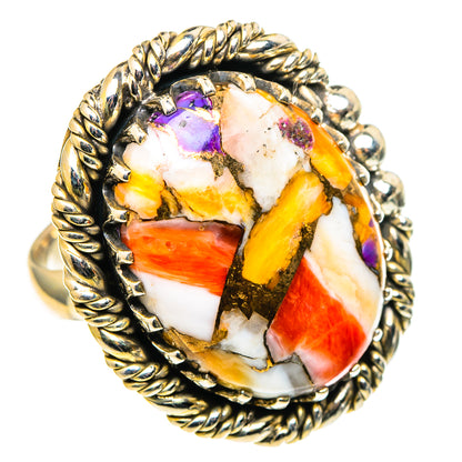 Oval mosaic stone ring with purple and orange/red pieces, twisted rope silver frame
