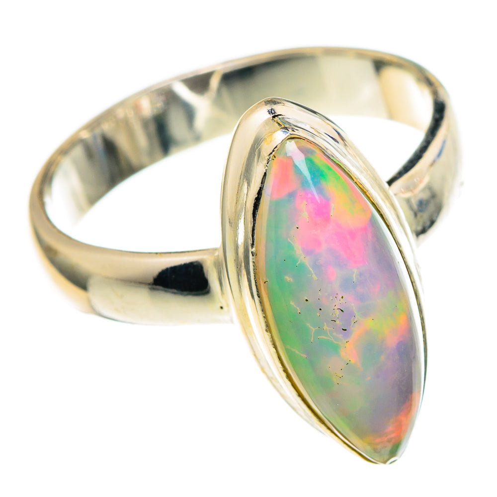 Oval iridescent opal set in polished sterling silver band, size 6.25