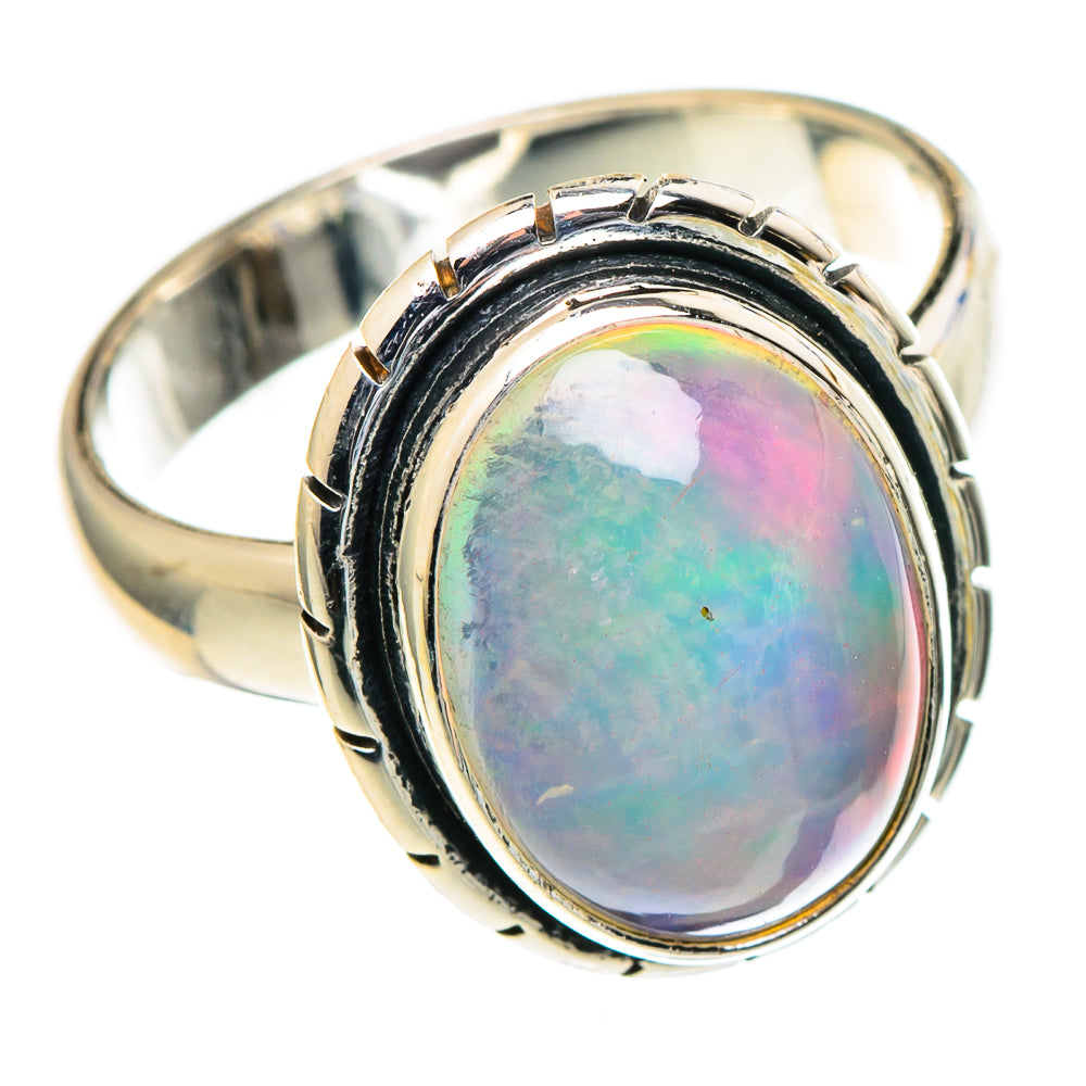 Sterling silver oval opal ring with black bezel, multicolor iridescent stone and open shank