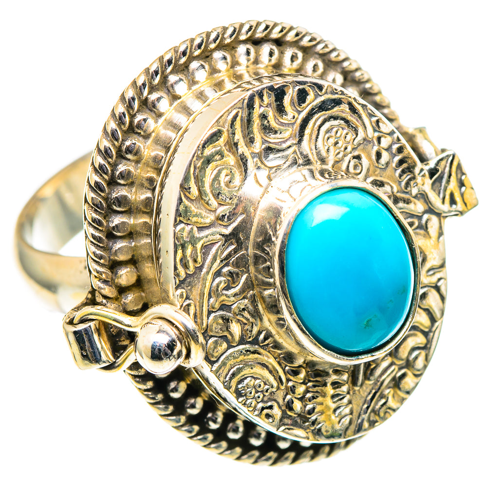 Turquoise blue oval cabochon sterling silver ring with engraved scrollwork and side details