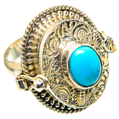 Turquoise blue oval cabochon sterling silver ring with engraved scrollwork and side details