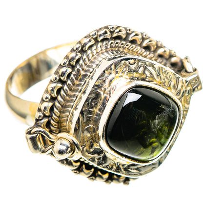 Sterling silver poison ring with large oval green tourmaline and ornate bezels