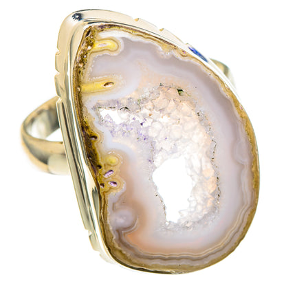 White geode slice ring with sterling silver bezel and iridescent crystal center