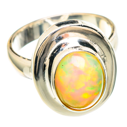 Yellow opal cabochon in polished 925 sterling silver bezel ring, wide shank