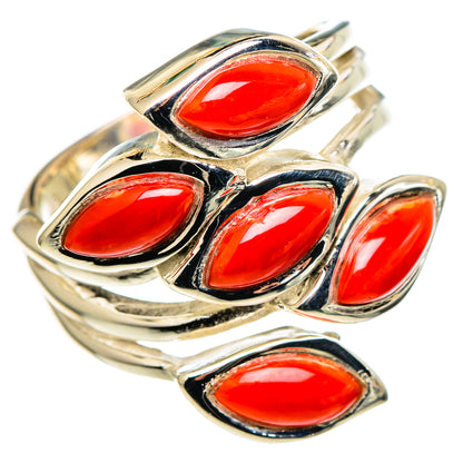 Sterling silver coral ring with six oval red stones on a contoured shank