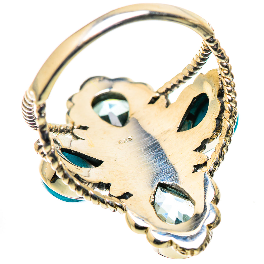 Silver ring band with sculpted setting and blue stones, turquoise cabochon accents