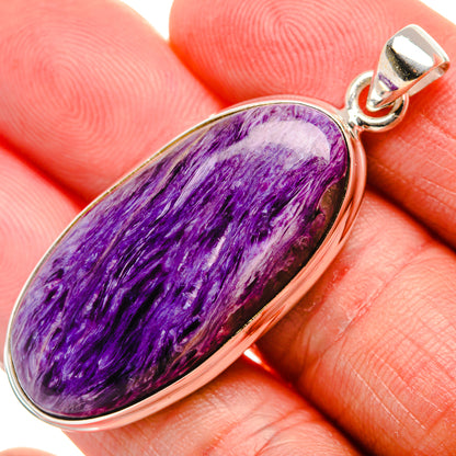 Oval charoite pendant in 925 sterling silver bezel, purple cabochon with bail