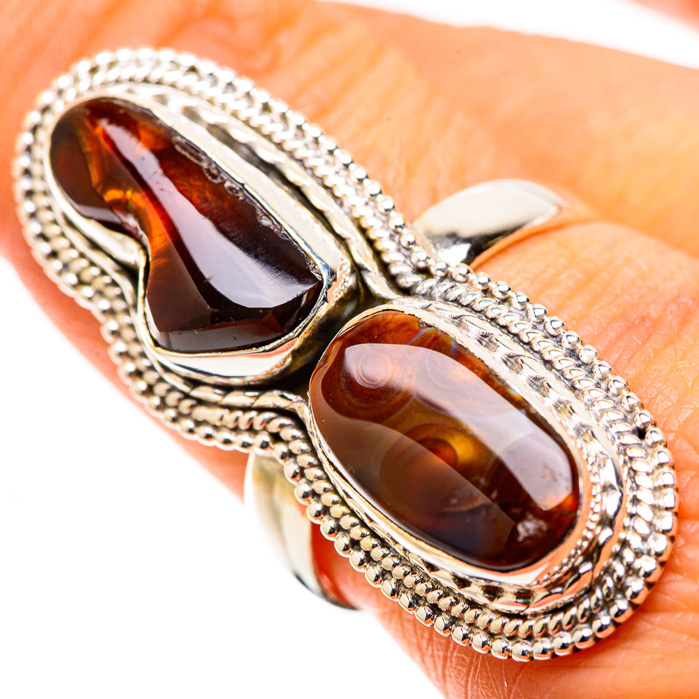 Large oval fire agate double-stone ring in sterling silver, ornate rope bezel