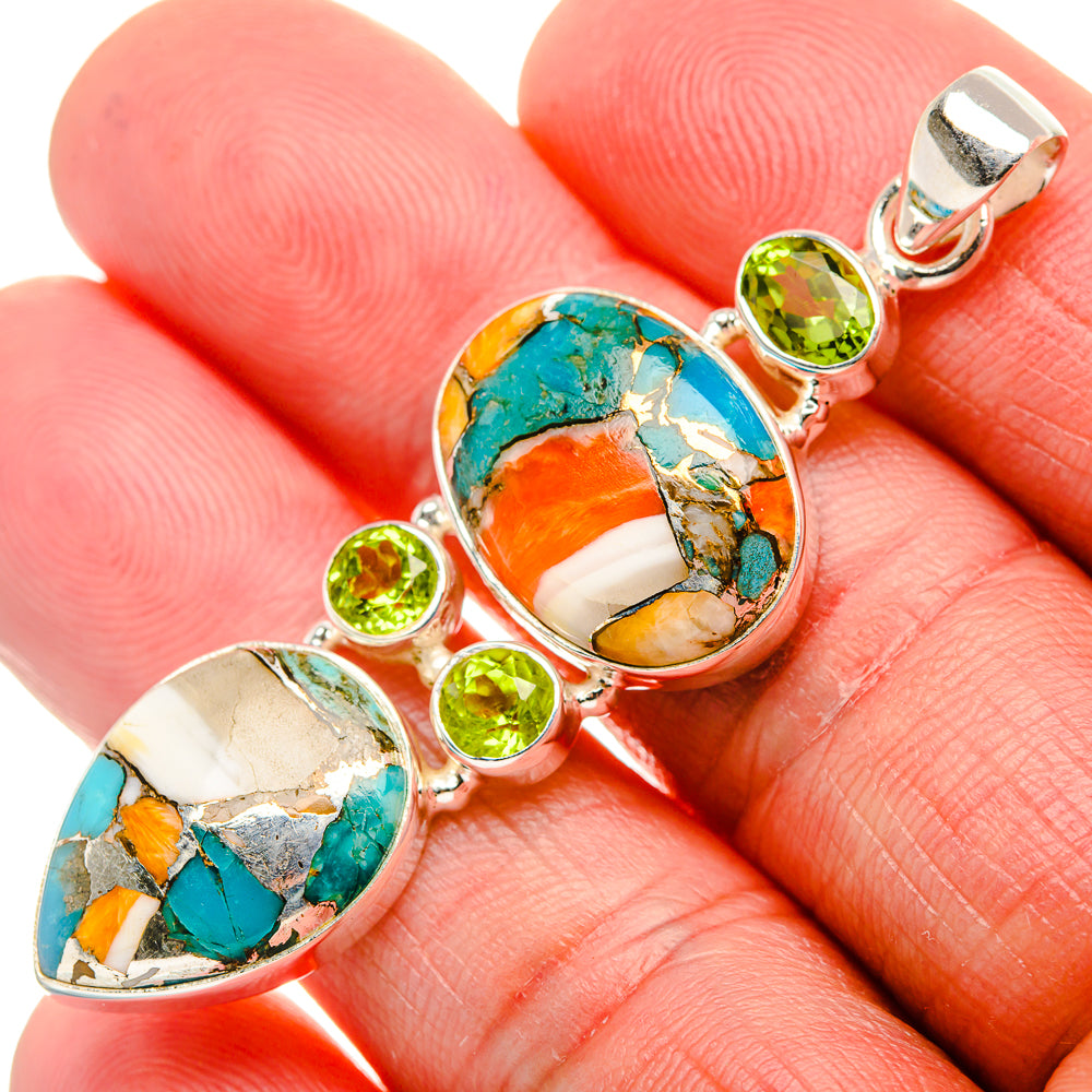 Spiny oyster turquoise-orange pendant with peridot green stones, set in 925 silver