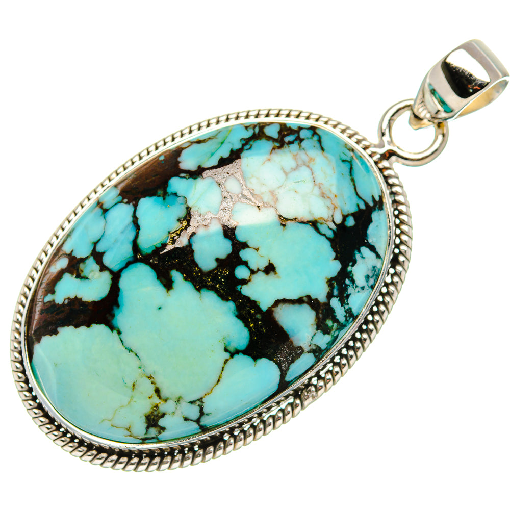 Turquoise oval pendant in sterling-silver bezel with loop bail, black veined blue stone