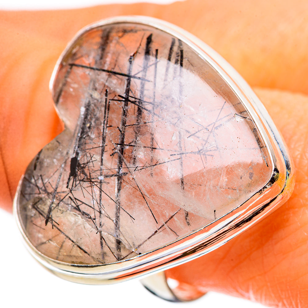 Heart-shaped sterling silver ring with clear quartz and black tourmaline-like inclusions