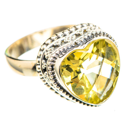 Sterling silver ring with oval lemon-yellow faceted quartz and beaded edge band