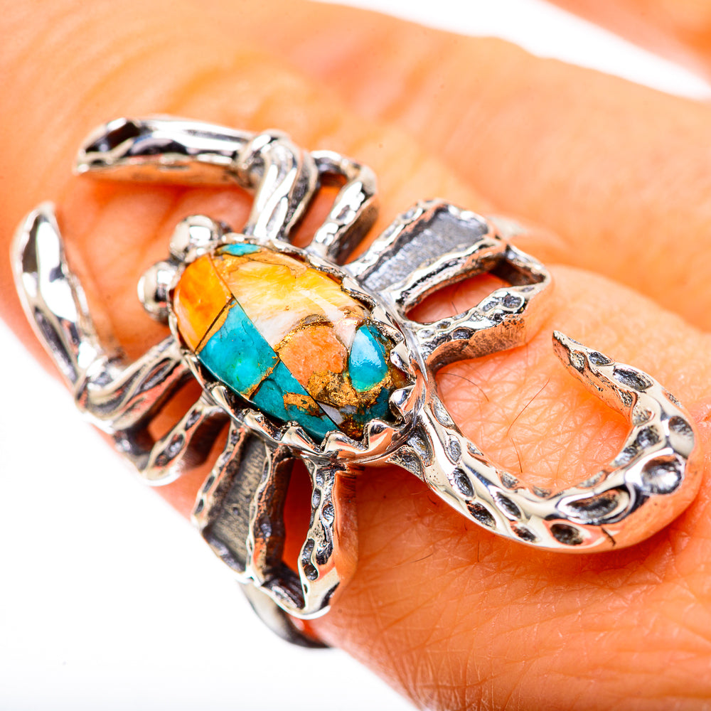 Sterling silver spiny oyster turquoise ring with oval inlay and ornate prongs