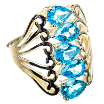925 sterling silver ring with four blue topaz teardrop stones in prong settings