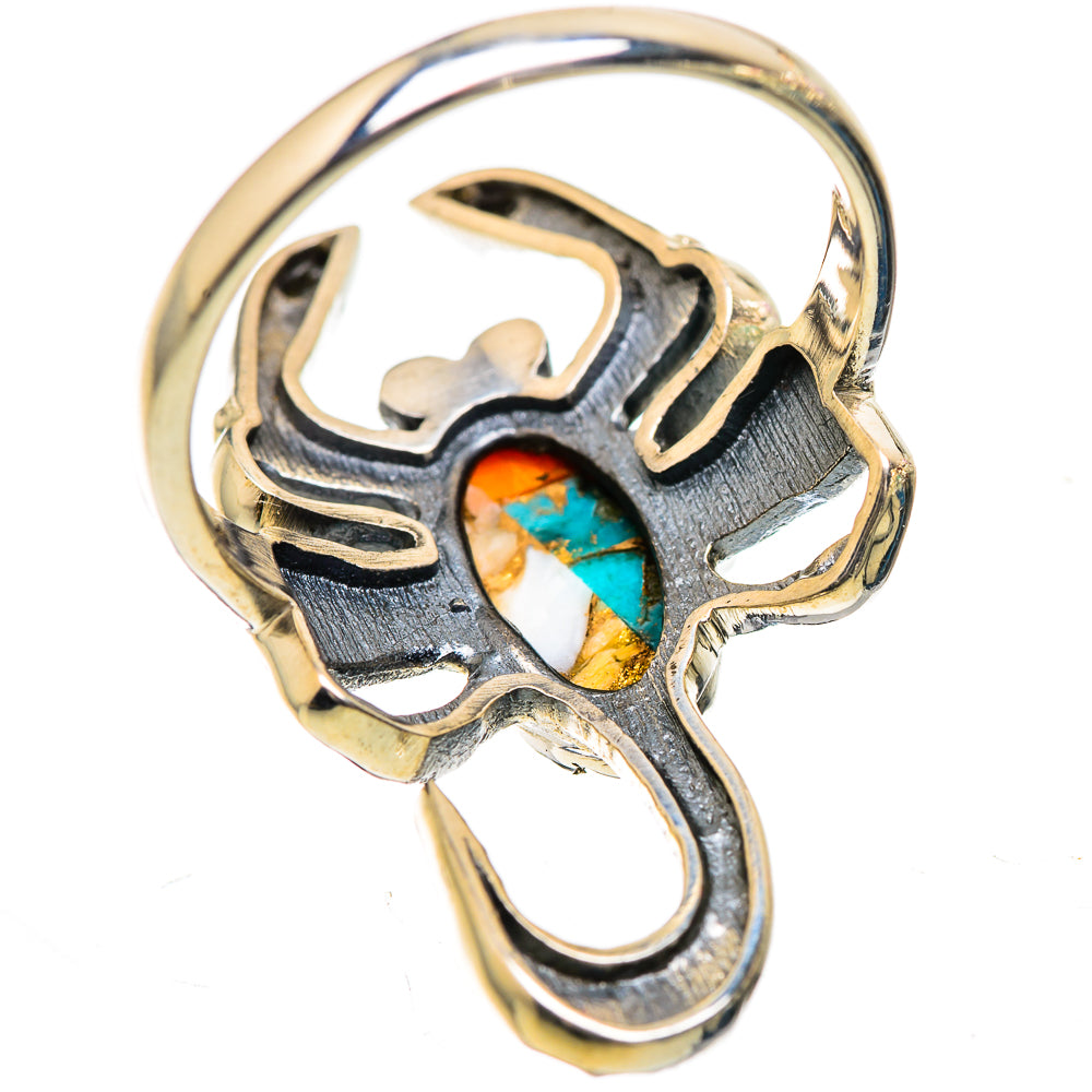 Metal-tone spiny oyster turquoise ring with oval inlay and openwork band