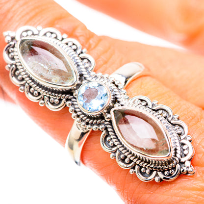 Sterling silver oval gemstone ring with filigree and bright blue center stone, size 8.25